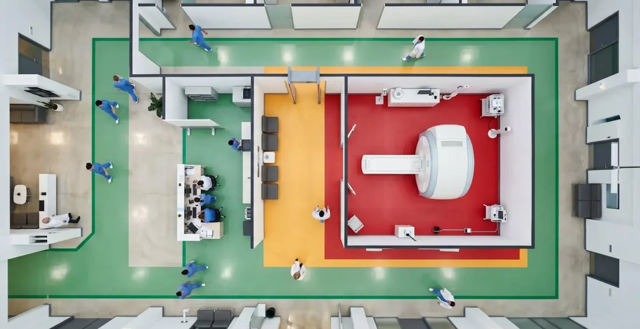 Aerial view of MRI facility showing safety zones and workflow patterns with color-coded floor areas